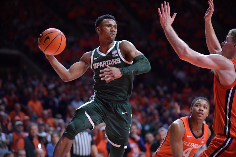 Jan 11, 2024; Champaign, Illinois, USA;  Michigan State Spartans guard Tyson Walker (2) looks to pass as Illinois Fighting Illini guard Marcus Domask (3) defends during the second half at State Farm Center. Mandatory Credit: Ron Johnson-USA TODAY Sports