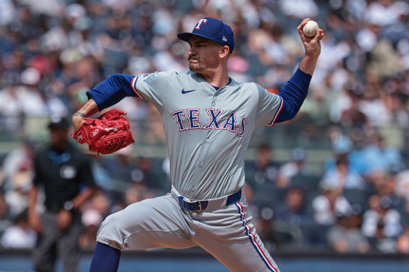 Aug 11, 2024; Bronx, New York, USA; Texas Rangers starting pitcher Andrew Heaney (44) delivers a pitch during the first inning against the New York Yankees at Yankee Stadium. Mandatory Credit: Vincent Carchietta-USA TODAY Sports