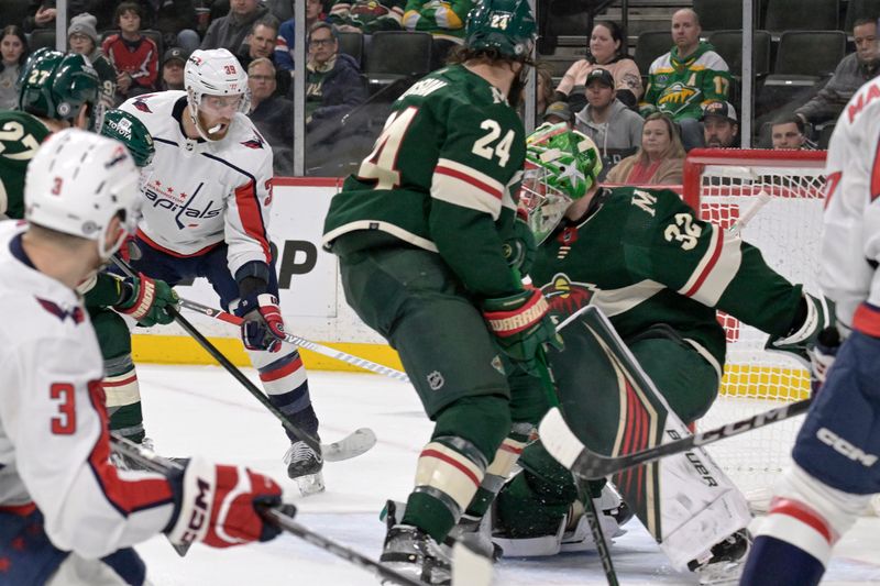 Jan 23, 2024; Saint Paul, Minnesota, USA;  Washington Capitals forward Anthony Mantha (39) puts the puck past Minnesota Wild goalie Filip Gustavsson (32) for his second goal of the night during the third period at Xcel Energy Center. Mandatory Credit: Nick Wosika-USA TODAY Sports