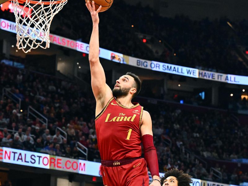 CLEVELAND, OHIO - FEBRUARY 12: Max Strus #1 of the Cleveland Cavaliers puts up a shot ahead of  Kelly Oubre Jr. #9 of the Philadelphia 76ers during the third quarter at Rocket Mortgage Fieldhouse on February 12, 2024 in Cleveland, Ohio. The 76ers defeated the Cavaliers 123-121. NOTE TO USER: User expressly acknowledges and agrees that, by downloading and or using this photograph, User is consenting to the terms and conditions of the Getty Images License Agreement. (Photo by Jason Miller/Getty Images)