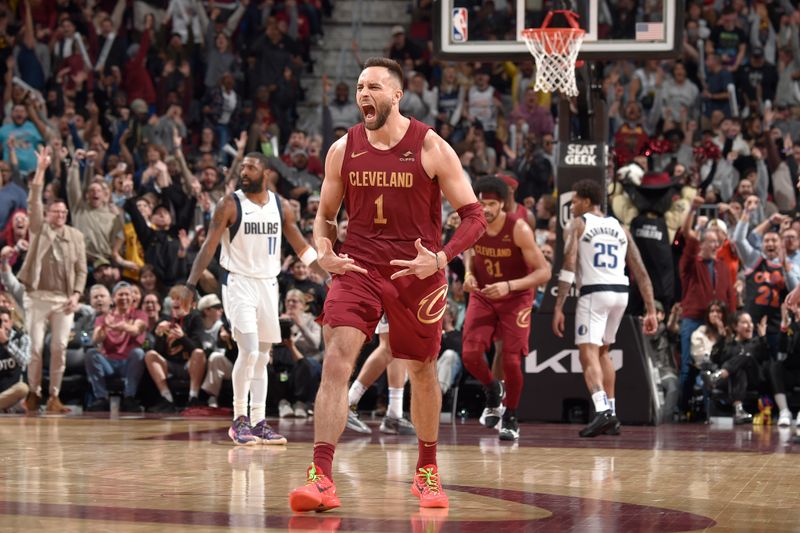 CLEVELAND, OH - FEBRUARY 27: Max Strus #1 of the Cleveland Cavaliers celebrates during the game against the Dallas Mavericks on February 27, 2024 at Rocket Mortgage FieldHouse in Cleveland, Ohio. NOTE TO USER: User expressly acknowledges and agrees that, by downloading and/or using this Photograph, user is consenting to the terms and conditions of the Getty Images License Agreement. Mandatory Copyright Notice: Copyright 2024 NBAE (Photo by David Liam Kyle/NBAE via Getty Images)