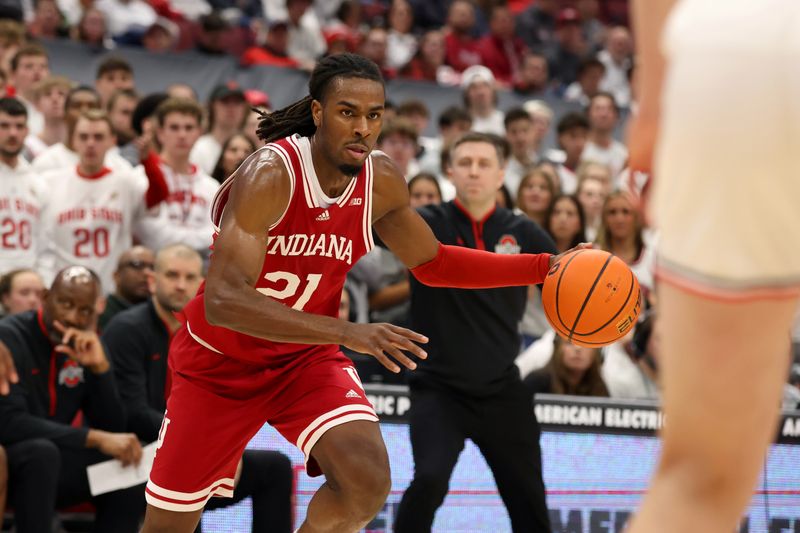 Jan 17, 2025; Columbus, Ohio, USA; Indiana Hoosiers forward Mackenzie Mgbako (21) dribbles the ball during the first half against the Ohio State Buckeyes at Value City Arena. Mandatory Credit: Joseph Maiorana-Imagn Images