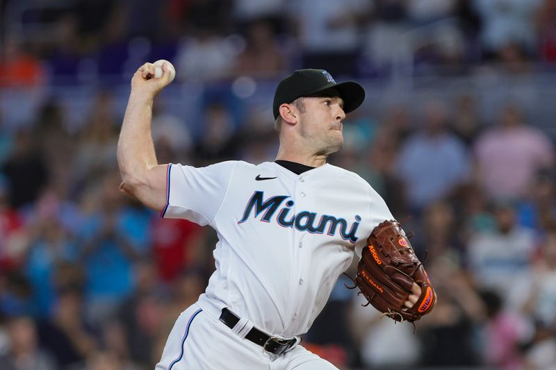 Jul 30, 2023; Miami, Florida, USA; Miami Marlins relief pitcher David Robertson (19) delivers a pitch against the Detroit Tigers during the ninth inning at loanDepot Park. Mandatory Credit: Sam Navarro-USA TODAY Sports