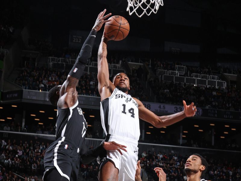 BROOKLYN, NY - FEBRUARY 10: Blake Wesley #14 of the San Antonio Spurs drives to the basket during the game against the Brooklyn Nets on February 10, 2024 at Barclays Center in Brooklyn, New York. NOTE TO USER: User expressly acknowledges and agrees that, by downloading and or using this Photograph, user is consenting to the terms and conditions of the Getty Images License Agreement. Mandatory Copyright Notice: Copyright 2024 NBAE (Photo by Nathaniel S. Butler/NBAE via Getty Images)