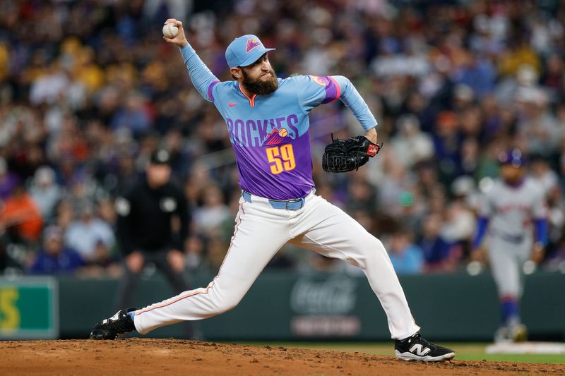Jun 6, 2025; Denver, Colorado, USA; Colorado Rockies relief pitcher Jake Bird (59) pitches in the sixth inning against the New York Mets at Coors Field. Mandatory Credit: Isaiah J. Downing-Imagn Images