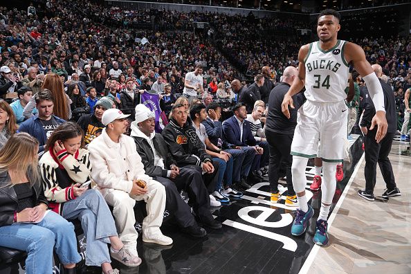 BROOKLYN, NY - DECEMBER 27: Vinicius Junior attends the game between the Milwaukee Bucks and the Brooklyn Nets on December 27, 2023 at Barclays Center in Brooklyn, New York. NOTE TO USER: User expressly acknowledges and agrees that, by downloading and or using this Photograph, user is consenting to the terms and conditions of the Getty Images License Agreement. Mandatory Copyright Notice: Copyright 2023 NBAE (Photo by Jesse D. Garrabrant/NBAE via Getty Images)