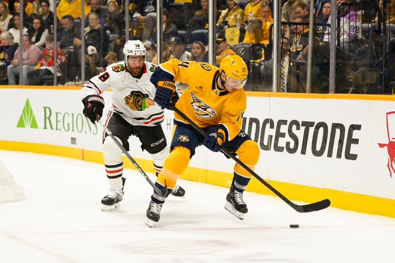 Jan 16, 2025; Nashville, Tennessee, USA; Nashville Predators center Gustav Nyquist (14) skates behind the net against the Chicago Blackhawks  during the first period at Bridgestone Arena. Mandatory Credit: Steve Roberts-Imagn Images