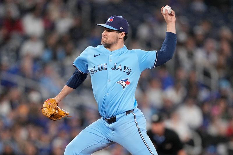 May 4, 2025; Toronto, Ontario, CAN; Toronto Blue Jays pitcher Brendon Little (54) pitches to the Cleveland Guardians during the ninth inning at Rogers Centre. Mandatory Credit: John E. Sokolowski-Imagn Images