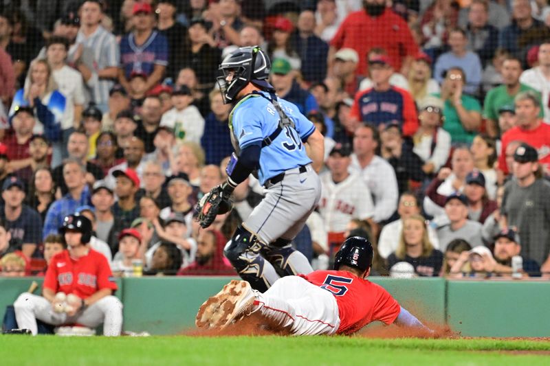 Sep 27, 2024; Boston, Massachusetts, USA; Boston Red Sox second baseman Vaughn Grissom (5) scores a run during the seventh inning against the Tampa Bay Rays at Fenway Park. Mandatory Credit: Eric Canha-Imagn Images