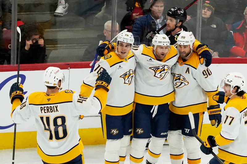 Nov 28, 2025; Chicago, Illinois, USA; Nashville Predators center Ryan O'Reilly (90) celebrates his goal against the Chicago Blackhawks with his teammates during the third period at United Center. Mandatory Credit: David Banks-Imagn Images