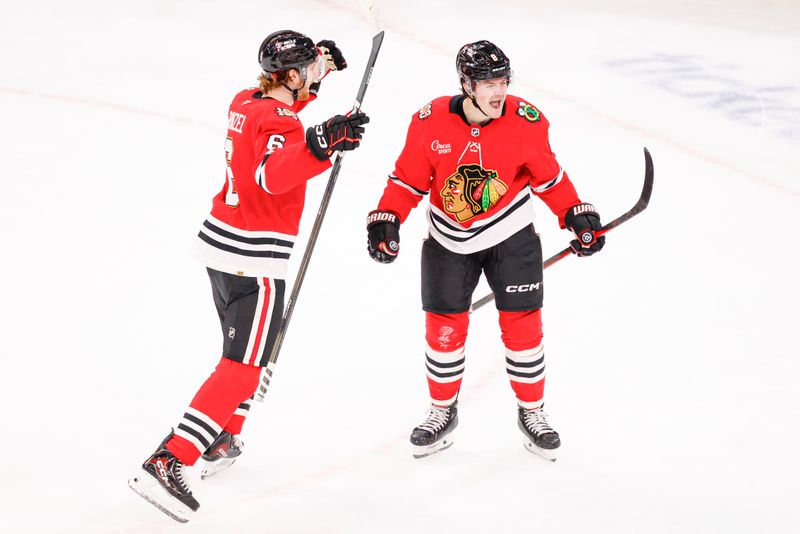 Oct 19, 2025; Chicago, Illinois, USA; Chicago Blackhawks center Ryan Donato (8) celebrates after scoring in overtime a game winning goal against the Anaheim Ducks at United Center. Mandatory Credit: Kamil Krzaczynski-Imagn Images