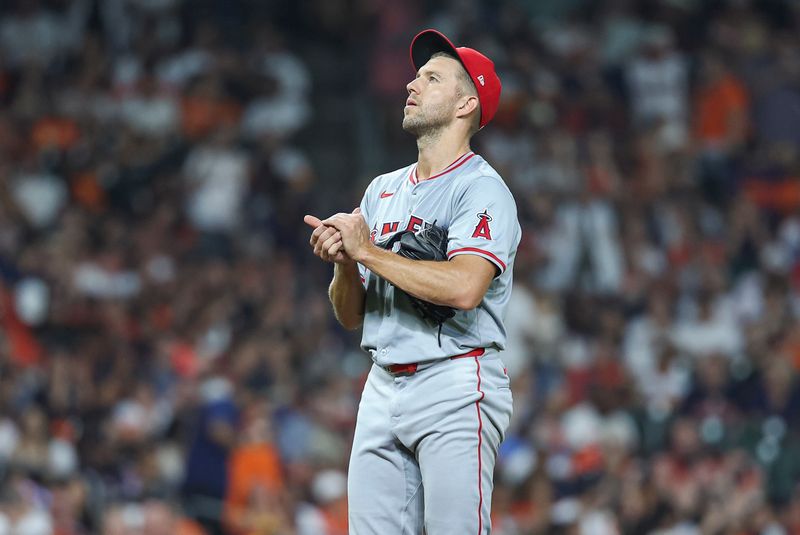 Sep 20, 2024; Houston, Texas, USA; Los Angeles Angels starting pitcher Tyler Anderson (31) reacts after a play during the third inning against the Houston Astros at Minute Maid Park. Mandatory Credit: Troy Taormina-Imagn Images