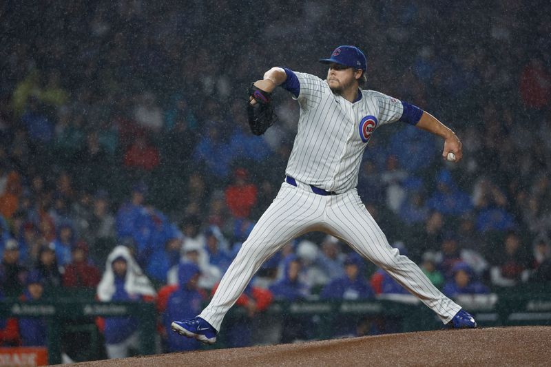 Jun 1, 2024; Chicago, Illinois, USA; Chicago Cubs starting pitcher Justin Steele (35) delivers a pitch during the first inning at Wrigley Field. Mandatory Credit: Kamil Krzaczynski-USA TODAY Sports