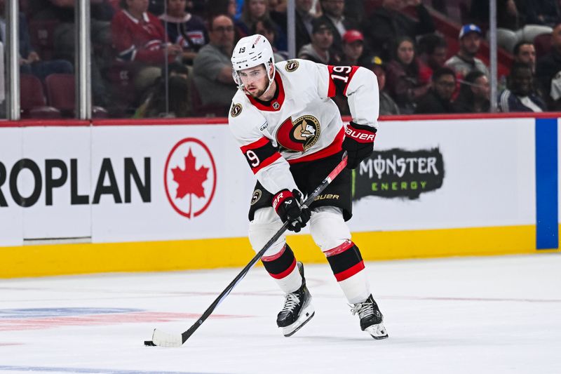 Oct 1, 2024; Montreal, Quebec, CAN; Ottawa Senators right wing Drake Batherson (19) skates with the puck against the Montreal Canadiens during the third period at Bell Centre. Mandatory Credit: David Kirouac-Imagn Images