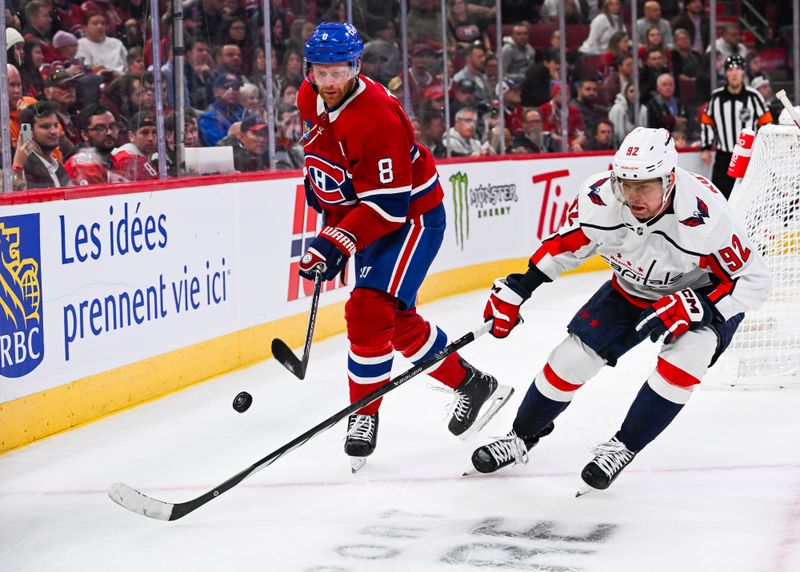 Oct 21, 2023; Montreal, Quebec, CAN; Montreal Canadiens defenseman Mike Matheson (8) defends the puck against Washington Capitals center Evgeny Kuznetsov (92) during the third period at Bell Centre. Mandatory Credit: David Kirouac-USA TODAY Sports