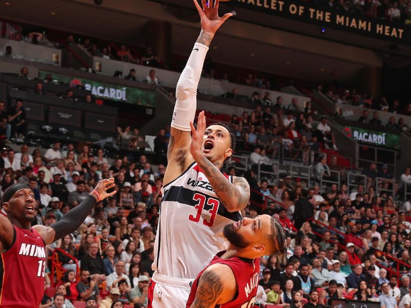 MIAMI, FL - MARCH 10: Kyle Kuzma #33 of the Washington Wizards drives to the basket during the game against the Miami Heat on March 10, 2024 at Kaseya Center in Miami, Florida. NOTE TO USER: User expressly acknowledges and agrees that, by downloading and or using this Photograph, user is consenting to the terms and conditions of the Getty Images License Agreement. Mandatory Copyright Notice: Copyright 2024 NBAE (Photo by Issac Baldizon/NBAE via Getty Images)