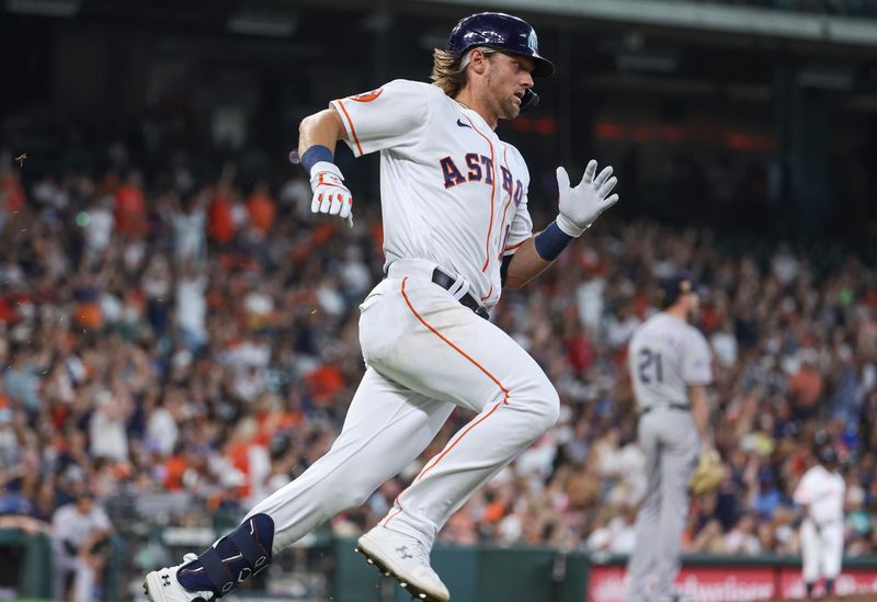 Jul 4, 2023; Houston, Texas, USA; Colorado Rockies starting pitcher Kyle Freeland (21) reacts and Houston Astros shortstop Grae Kessinger (16) runs to first base after hitting a home run during the third inning at Minute Maid Park. Mandatory Credit: Troy Taormina-USA TODAY Sports