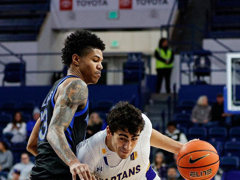 Jan 13, 2024; Colorado Springs, Colorado, USA; San Jose State Spartans guard Alvaro Cardenas (13) controls the ball under pressure from Air Force Falcons forward Chase Beasley (13) in the second half at Clune Arena. Mandatory Credit: Isaiah J. Downing-USA TODAY Sports