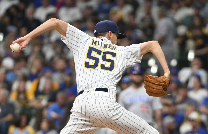 Sep 30, 2023; Milwaukee, Wisconsin, USA; Milwaukee Brewers relief pitcher Hoby Milner (55) delivers a pitch against the Chicago Cubs in the seventh inning at American Family Field. Mandatory Credit: Michael McLoone-USA TODAY Sports