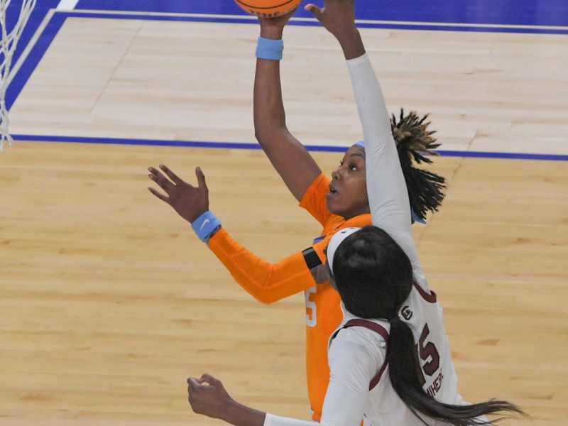 Mar 5, 2023; Greenville, SC, USA; Tennessee guard Jordan Horston (25) shoots near South Carolina forward Laeticia Amihere (15) during the second quarter of the SEC Women's Basketball Tournament at Bon Secours Wellness Arena. Mandatory Credit: Ken Ruinard-USA TODAY Sports