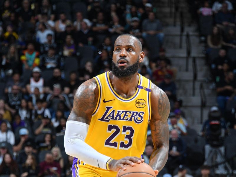 SAN ANTONIO, TX - NOVEMBER 27: LeBron James #23 of the Los Angeles Lakers shoots the ball during the game against the San Antonio Spurs on November 27, 2024 at the Frost Bank Center in San Antonio, Texas. NOTE TO USER: User expressly acknowledges and agrees that, by downloading and or using this photograph, user is consenting to the terms and conditions of the Getty Images License Agreement. Mandatory Copyright Notice: Copyright 2024 NBAE (Photos by Michael Gonzales/NBAE via Getty Images)