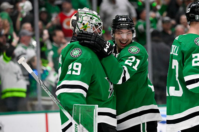 May 15, 2023; Dallas, Texas, USA; Dallas Stars goaltender Jake Oettinger (29) and left wing Jason Robertson (21) celebrate after the Stars defeat the Seattle Kraken in game seven of the second round of the 2023 Stanley Cup Playoffs at the American Airlines Center. Mandatory Credit: Jerome Miron-USA TODAY Sports