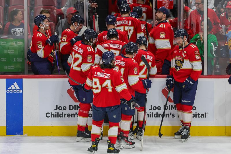 Nov 24, 2023; Sunrise, Florida, USA; Florida Panthers players return to the locker room after the game against the Winnipeg Jets at Amerant Bank Arena. Mandatory Credit: Sam Navarro-USA TODAY Sports