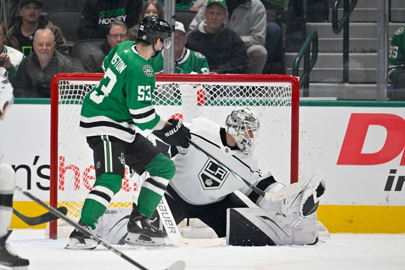 Jan 16, 2024; Dallas, Texas, USA; Los Angeles Kings goaltender Cam Talbot (39) makes a glove save in front of Dallas Stars center Wyatt Johnston (53) during the first period at the American Airlines Center. Mandatory Credit: Jerome Miron-USA TODAY Sports