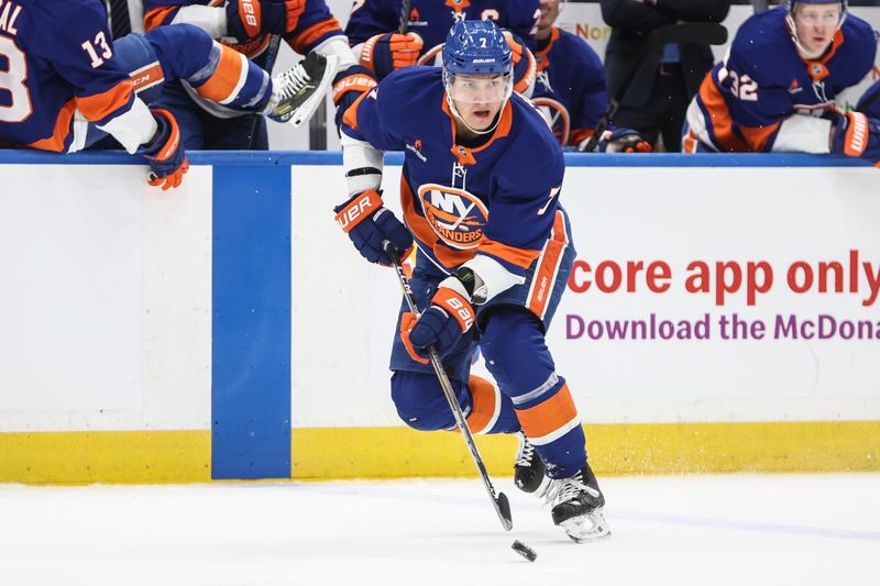 Jan 16, 2025; Elmont, New York, USA;  New York Islanders right wing Maxim Tsyplakov (7) skates down ice on a breakaway in the second period against the Philadelphia Flyers at UBS Arena. Mandatory Credit: Wendell Cruz-Imagn Images