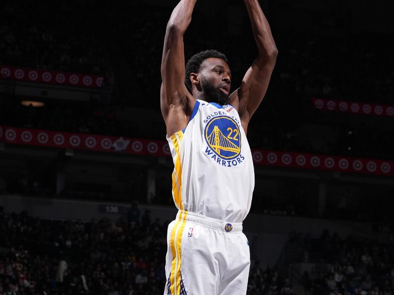 MINNEAPOLIS, MN -  MARCH 24: Andrew Wiggins #22 of the Golden State Warriors grabs a rebound during the game against the Minnesota Timberwolves on March 24, 2024 at Target Center in Minneapolis, Minnesota. NOTE TO USER: User expressly acknowledges and agrees that, by downloading and or using this Photograph, user is consenting to the terms and conditions of the Getty Images License Agreement. Mandatory Copyright Notice: Copyright 2024 NBAE (Photo by Jordan Johnson/NBAE via Getty Images)