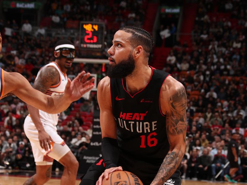 MIAMI, FL - JANUARY 29: Caleb Martin #16 of the Miami Heat handles the ball during the game against the Phoenix Suns on January 29, 2024 at Kaseya Center in Miami, Florida. NOTE TO USER: User expressly acknowledges and agrees that, by downloading and or using this Photograph, user is consenting to the terms and conditions of the Getty Images License Agreement. Mandatory Copyright Notice: Copyright 2024 NBAE (Photo by Issac Baldizon/NBAE via Getty Images)