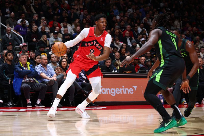 TORONTO, CANADA - JANUARY 15: RJ Barrett #9 of the Toronto Raptors handles the ball during the game against the Boston Celtics on January 15, 2025 at the Scotiabank Arena in Toronto, Ontario, Canada.  NOTE TO USER: User expressly acknowledges and agrees that, by downloading and or using this Photograph, user is consenting to the terms and conditions of the Getty Images License Agreement.  Mandatory Copyright Notice: Copyright 2025 NBAE (Photo by Vaughn Ridley/NBAE via Getty Images)