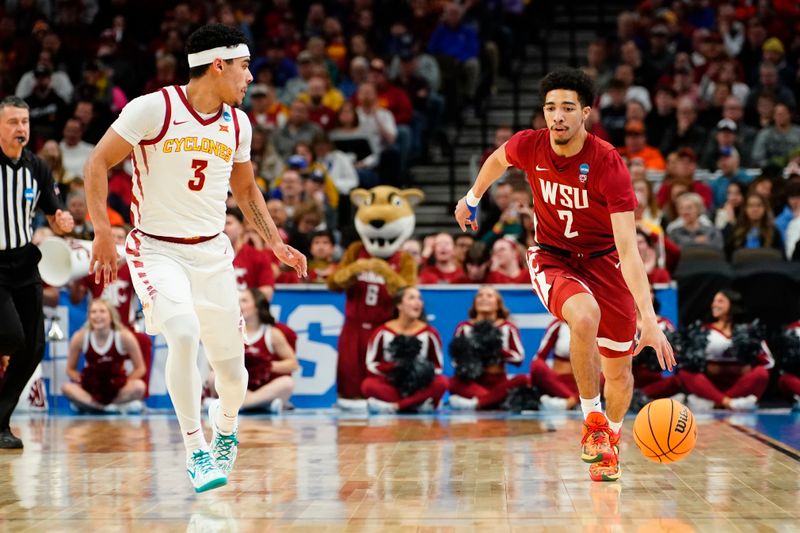 Mar 23, 2024; Omaha, NE, USA; Washington State Cougars guard Myles Rice (2) dribbles the ball against Iowa State Cyclones guard Tamin Lipsey (3) during the first half of the second round of the 2024 NCAA Tournament at CHI Health Center Omaha. Mandatory Credit: Dylan Widger-USA TODAY Sports