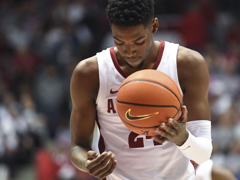 Feb 18, 2023; Tuscaloosa, Alabama, USA; Alabama forward Brandon Miller (24) prepares to take a free throw against Georgia at Coleman Coliseum. Mandatory Credit: Gary Cosby Jr.-USA TODAY Sports