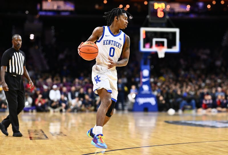 Dec 9, 2023; Philadelphia, Pennsylvania, USA; Kentucky Wildcats guard Rob Dillingham (0) controls the ball against the Penn Quakers in the second half at Wells Fargo Center. Mandatory Credit: Kyle Ross-USA TODAY Sports