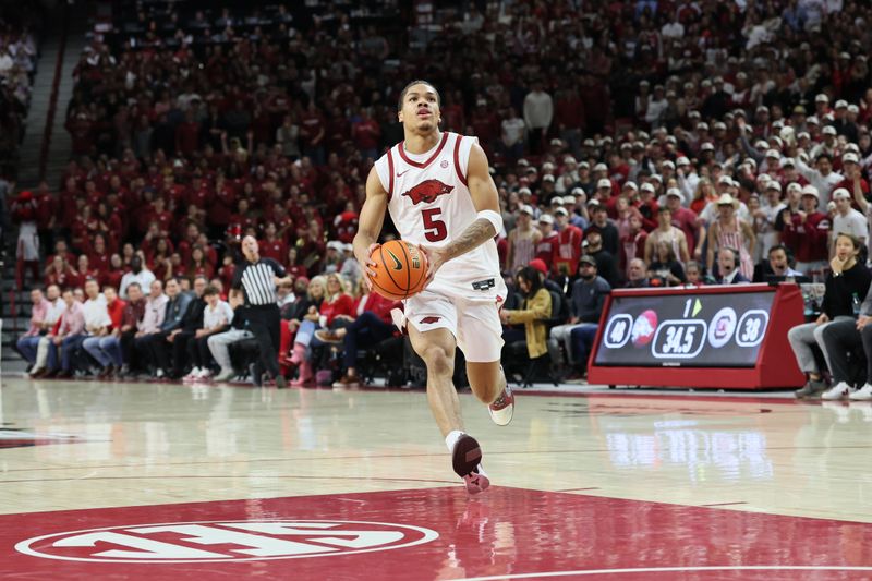 Jan 14, 2026; Fayetteville, Arkansas, USA; Arkansas Razorbacks guard Darius Acuff Jr (5) drives to the basket during the first half against the South Carolina Gamecocks at Bud Walton Arena. Arkansas won 108-74. Mandatory Credit: Nelson Chenault-Imagn Images