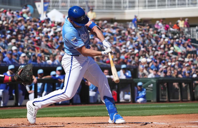 Mar 13, 2024; Surprise, Arizona, USA; Kansas City Royals right fielder Hunter Renfroe (16) bats against the Los Angeles Angels during the first inning at Surprise Stadium. Mandatory Credit: Joe Camporeale-USA TODAY Sports