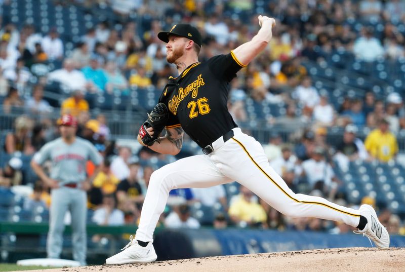 Jun 18, 2024; Pittsburgh, Pennsylvania, USA;  Pittsburgh Pirates starting pitcher Bailey Falter (26) delivers a pitch against the Cincinnati Reds during the second inning at PNC Park. Mandatory Credit: Charles LeClaire-USA TODAY Sports
