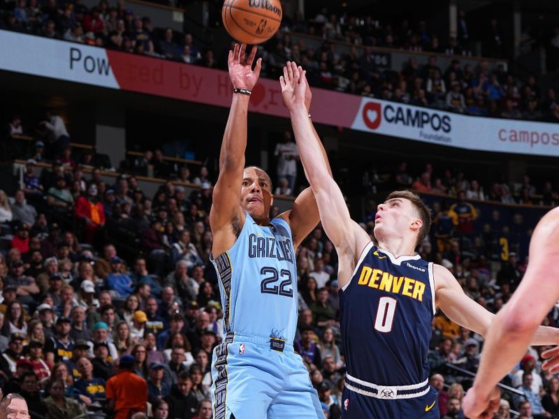 DENVER, CO - MARCH 25: Desmond Bane #22 of the Memphis Grizzlies shoots the ball during the game against the Denver Nuggets on March 25, 2024 at the Ball Arena in Denver, Colorado. NOTE TO USER: User expressly acknowledges and agrees that, by downloading and/or using this Photograph, user is consenting to the terms and conditions of the Getty Images License Agreement. Mandatory Copyright Notice: Copyright 2024 NBAE (Photo by Garrett Ellwood/NBAE via Getty Images)