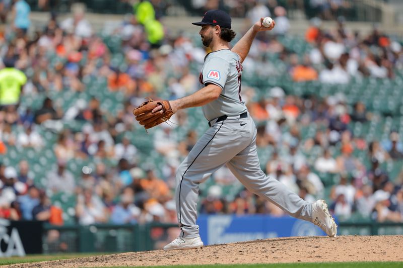 Jul 11, 2024; Detroit, Michigan, USA;  Cleveland Guardians catcher Austin Hedges (27) pitches in the seventh inning against the Detroit Tigers at Comerica Park. Mandatory Credit: Rick Osentoski-USA TODAY Sports