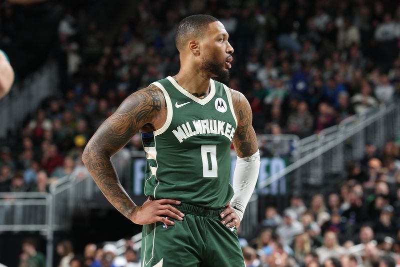 MILWAUKEE, WI - FEBRUARY 9:   Damian Lillard #0 of the Milwaukee Bucks looks on during the game against the Philadelphia 76ers on February  9, 2025 at Fiserv Forum Center in Milwaukee, Wisconsin. NOTE TO USER: User expressly acknowledges and agrees that, by downloading and or using this Photograph, user is consenting to the terms and conditions of the Getty Images License Agreement. Mandatory Copyright Notice: Copyright 2025 NBAE (Photo by Jeff Haynes/NBAE via Getty Images).