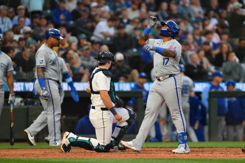 May 14, 2024; Seattle, Washington, USA; Kansas City Royals designated hitter Nelson Velazquez (17) crosses home plate after hitting a 3-run home run against the Seattle Mariners during the seventh inning at T-Mobile Park. Mandatory Credit: Steven Bisig-USA TODAY Sports