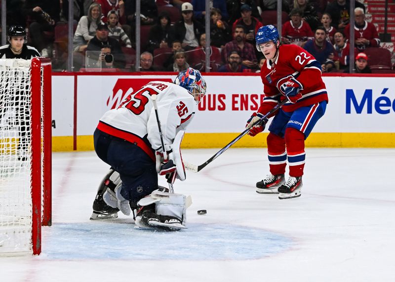 Oct 21, 2023; Montreal, Quebec, CAN; Washington Capitals goalie Darcy Kuemper (35) makes a save against Montreal Canadiens right wing Cole Caufield (22) during the second period at Bell Centre. Mandatory Credit: David Kirouac-USA TODAY Sports