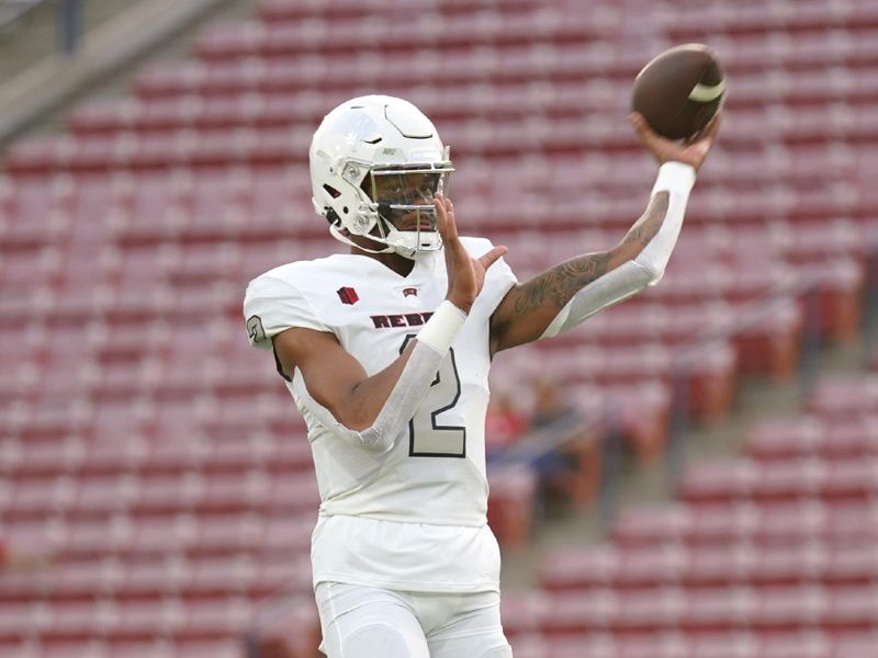 Sep 24, 2021; Fresno, California, USA; UNLV Rebels quarterback Doug Brumfield (2) throws a pass before the start of the game against the Fresno State Bulldogs at Bulldog Stadium. Mandatory Credit: Cary Edmondson-USA TODAY Sports