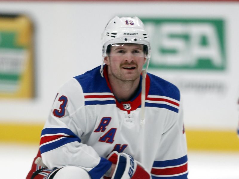 Mar 16, 2024; Pittsburgh, Pennsylvania, USA; New York Rangers left wing Alexis Lafreniere (13) warms up before the game against the Pittsburgh Penguins at PPG Paints Arena. Mandatory Credit: Charles LeClaire-USA TODAY Sports