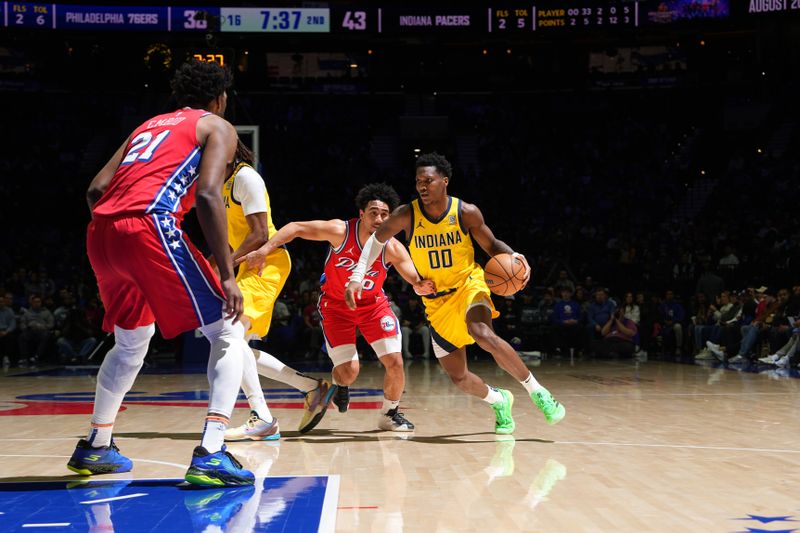 PHILADELPHIA, PA - DECEMBER 13: Bennedict Mathurin #00 of the Indiana Pacers drives to the basket during the game against the Philadelphia 76ers on December 13, 2024 at the Wells Fargo Center in Philadelphia, Pennsylvania NOTE TO USER: User expressly acknowledges and agrees that, by downloading and/or using this Photograph, user is consenting to the terms and conditions of the Getty Images License Agreement. Mandatory Copyright Notice: Copyright 2024 NBAE (Photo by Jesse D. Garrabrant/NBAE via Getty Images)