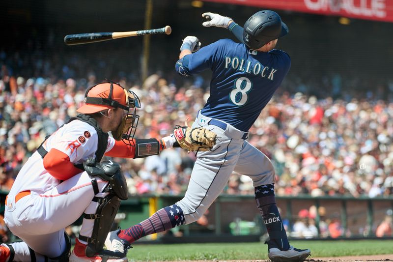 Jul 4, 2023; San Francisco, California, USA; Seattle Mariners designated hitter AJ Pollock (8) swings at a pitch and throws his bat against San Francisco Giants catcher Patrick Bailey (14) during the eighth inning at Oracle Park. Mandatory Credit: Robert Edwards-USA TODAY Sports