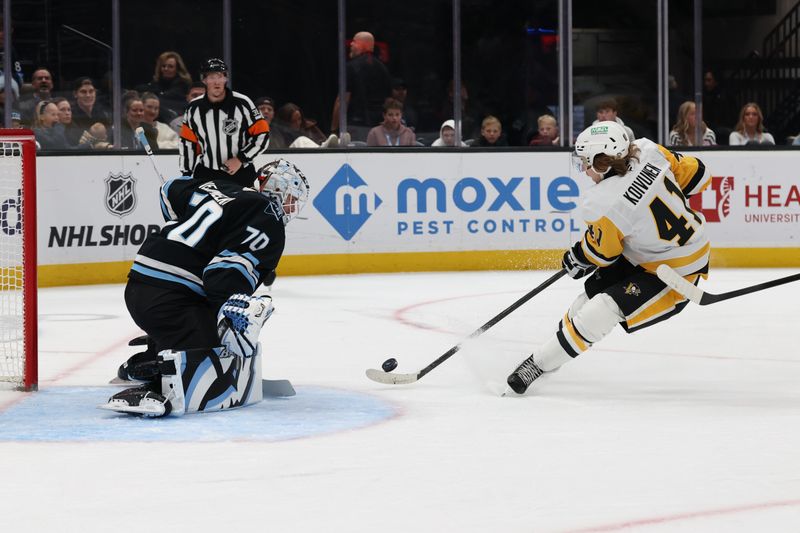 Mar 14, 2026; Salt Lake City, Utah, USA; Pittsburgh Penguins right wing Ville Koivunen (41) takes a shot against Utah Mammoth goaltender Karel Vejmelka (70) during the first period at Delta Center. Mandatory Credit: Rob Gray-Imagn Images Mar 14, 2026; Salt Lake City, Utah, USA; Pittsburgh Penguins right wing Ville Koivunen (41) takes a shot against Utah Mammoth goaltender Karel Vejmelka (70) during the first period at Delta Center. Mandatory Credit: Rob Gray-Imagn Images