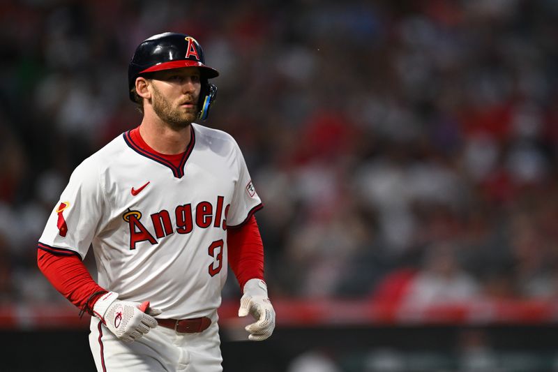 Jul 27, 2024; Anaheim, California, USA; Los Angeles Angels outfielder Taylor Ward (3) walks against the Oakland Athletics during the sixth inning at Angel Stadium. Mandatory Credit: Jonathan Hui-USA TODAY Sports