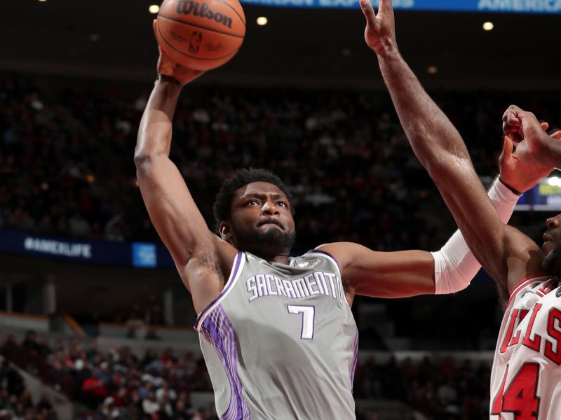 CHICAGO, IL - MARCH 15: Chimezie Metu #7 of the Sacramento Kings drives to the basket during the game against the Chicago Bulls on March 15, 2023 at United Center in Chicago, Illinois. NOTE TO USER: User expressly acknowledges and agrees that, by downloading and or using this photograph, User is consenting to the terms and conditions of the Getty Images License Agreement. Mandatory Copyright Notice: Copyright 2023 NBAE (Photo by Gary Dineen/NBAE via Getty Images)